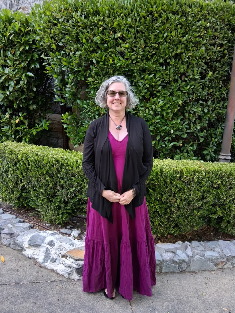 Wendy Welborn standing in a garden